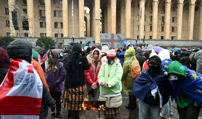 Demonstrators gather at the Georgian parliament during a protest against the results of the last month's parliamentary elections in Tbilisi. Photograph: Vano Shlamov/AFP via Getty Images