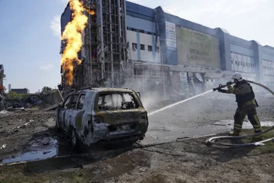 Firefighters extinguish a fire after a Russian missile attack in Kharkiv, Ukraine, on Sept. 1, 2024. 