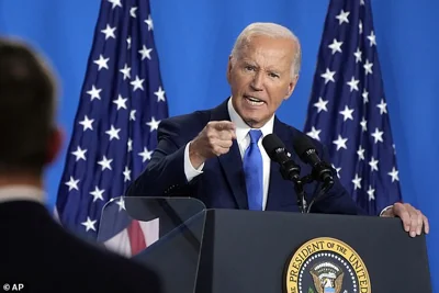 A spokesman for the U.S. National Security Council said the United States and its NATO allies are prepared to deliver a swift and severe response if Iran goes ahead with its plans. Pictured: President Joe Biden talks at a NATO summit in Washington on July 11