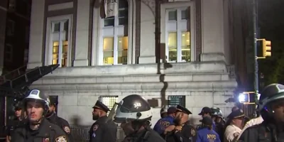 NYPD seen inside Columbia building, breaking door open