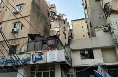 A view shows damage after what security sources said was a strike on Beirut's southern suburbs, Lebanon