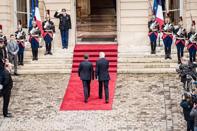 Does Michel Barnier's appointment as prime minister of France signal the continuation or the end of Macronism?