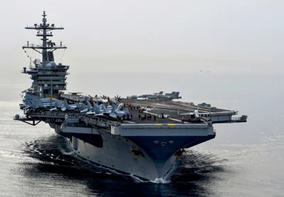 The aircraft carrier USS Theodore Roosevelt (CVN 71) sails in the Arabian Sea, in this U.S. Navy