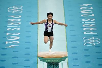 Philippines' Carlos Edriel Yulo competes in the artistic gymnastics men's vault final during the Paris 2024 Olympic Games at the Bercy Arena in Paris, on August 4, 2024. (Photo by Paul ELLIS / AFP)