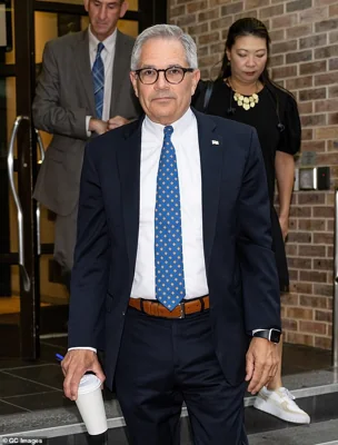 Philadelphia DA Larry Krasner, seen outside Fox 29 Studios in Philadelphia, has sued Musk for breaching lottery and election laws