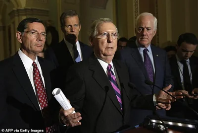 Senate Majority Leader Mitch McConnell (C), with Senators John Barrasso (L) of Wyoming; John Thune (2nd L) of South Dakota and Majority Whip John Cornyn (2nd R). Cornyn and Thune are in the running for Senate Majority Leader