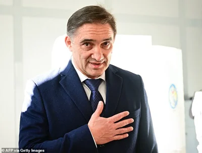 Moldova's Presidential candidate Aleksandr Stoianoglo reacts afther he casted his vote for the presidential election at a polling station in Chisinau