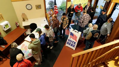 Citizens go through the voting process at Scheig Center & Gardens on Election Day