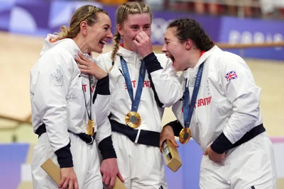 Great Britain’s Katy Marchant, Emma Finucane and Sophie Capewell celebrate their women”s team sprint gold secured with a world record (David Davies/PA).