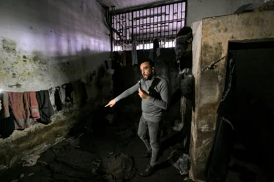 Former prisoner Mohamed Darwish gives AFP a guided tour of the feared detention centre of the Palestine Branch of Syrian military intelligence where he was interrogated for 120 days