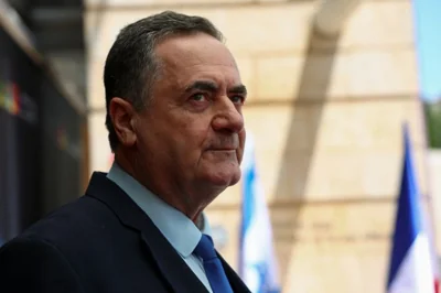 Israeli Foreign Minister Israel Katz waits for his British and French counterparts for a meeting, amid the conflict between Israel and Hamas, in Jerusalem August 16, 2024. REUTERS/Florion Goga