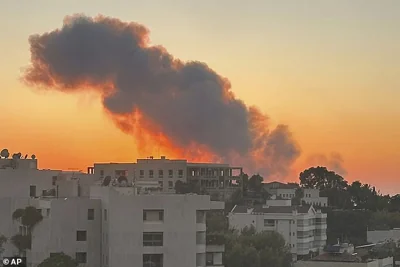 Smoke rises from Israeli airstrikes in Beirut, seen from Baabda on Friday