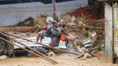 People &#039;jump from roof to roof&#039; as floods kill 148 in Nepal