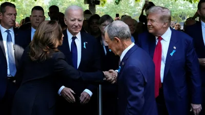 US Vice President and Democratic presidential candidate Kamala Harris (L) shakes hands with former US President and Republican presidential candidate Donald Trump (R).