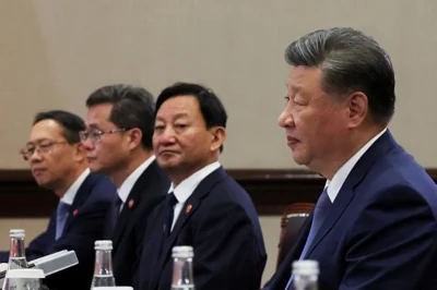 China's President Xi Jinping, right, looks on during a meeting with U.S. President Joe Biden on the sidelines of the APEC summit in Lima, Peru, Nov. 16. Reuters-Yonhap