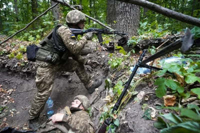 Ukrainian soldiers from the 3rd Spartan Task Force Brigade are taking part in tactical and medical training exercises at an undisclosed location in Kharkiv region, Ukraine, Monday, July 22, 2024. (AP Photo/Andrii Marienko)