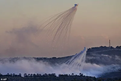 A shell from Israeli artillery explodes over Dahaira, a Lebanese border village with Israel, south Lebanon, Monday, October 16, 2023
