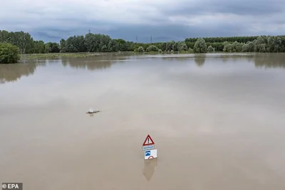 An aerial view of an area affected by the flood of the Secchia river in Modena, northern Italy, on June 25