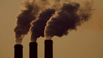 Emissions rise from smokestacks at the Jeffrey Energy Center coal power plant, near Emmett, Kan., Sept. 18, 2021.