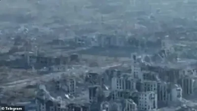 The heavily damaged town of Vovchansk moments before the alleged ODAB-9000 was dropped