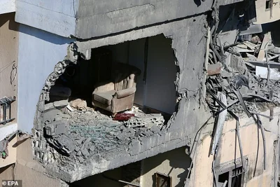 A destroyed building near a site targeted by an Israeli airstrike in Sarafand, southern Lebanon, 30 October 2024