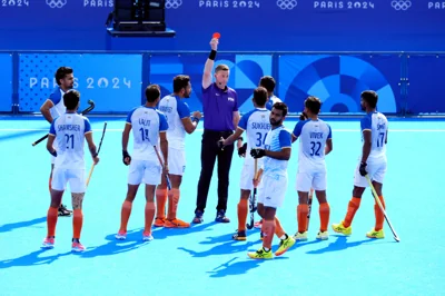 India’s Amit Rohidas is sent off by umpire Sean Rapaport (Peter Byrne, PA)