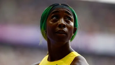 Shelly-Ann Fraser-Pryce of Jamaica reacts after the heats(REUTERS)