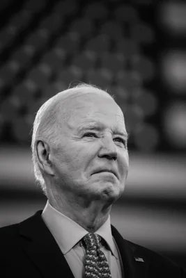 A black-and-white portrait of President Biden. 
