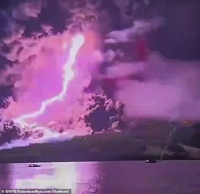 Footage shared by Indonesia's disaster mitigation agency showed strikes of lightning flashing above Ruang's crater