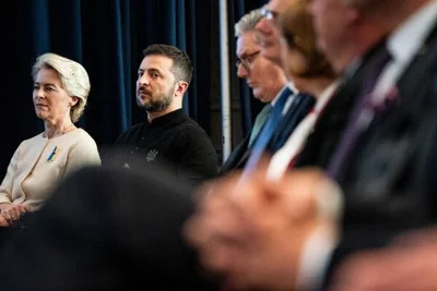 Volodymyr Zelensky, second from left, stands with other world leaders including Ursula von der Leyen, left, the president of the European Commission.