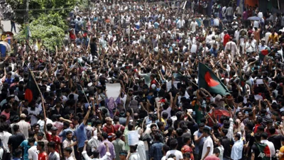 Bangladesh protesters call for march to Dhaka in defiance of curfew