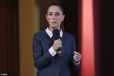 Mexican President Claudia Sheinbaum speaking at her press conference in Mexico City on November 26 where she said Mexico would retaliate if the U.S. imposed 25% tariffs as Trump threatened