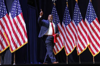 North Carolina Lt. Gov. Mark Robinson walks on stage at an event for former President Donald Trump in Asheville, N.C., on Aug. 14, 2024.