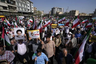 Iranians attend an anti-Israeli gathering after Friday prayers in Tehran, April 19, 2024