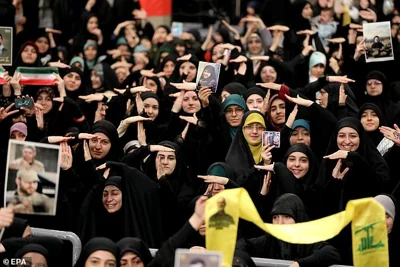 Some students made a hand gesture given by the slain Hezbollah leader Hassan Nasrallah in 2020 in a speech in which he threatened that American troops would "return in coffins."