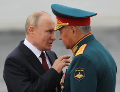 Vladimir Putin with ex defense secretary