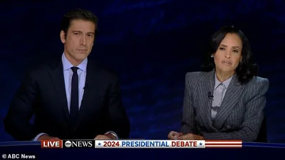 Debate moderators David Muir and Linsey Davis of ABC News