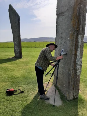 Aberystwyth University geologist Nick Pearce analysing Neolithic standing stones in Orkney