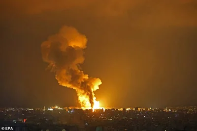 Smoke rises from a fire after an explosion following an Israeli strike at Choueifat district in Beirut, Lebanon, early October 6