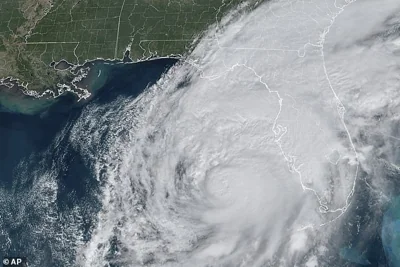 A satellite image shows Hurricane Milton swirling in the Gulf of Mexico approaching Florida