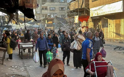 Displaced Palestinians flee Beit Lahiya amid an Israeli military operation in the northern Gaza Strip 