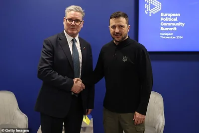 Sir Keir shakes hands with President of Ukraine Volodymyr Zelenskyy during the European Political Community summit at Puskas Arena in November in Budapest, Hungary