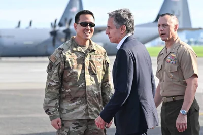 US Secretary of State Antony Blinken (center) is welcomed upon arrival for the start of his two-day visit, at Yokota Air Base in Fussa, western Tokyo, on July 28, 2024. AFP
