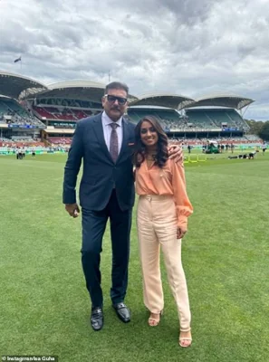 Guha is pictured with Indian great Ravi Shastri ahead of the Test series between the two powerhouse cricket nations