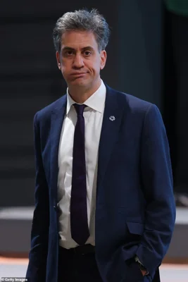 Ed Miliband, Secretary of State for Energy Security and Net Zero of the United Kingdom, chats during a break in the second part of the closing plenary on day twelve at the UNFCCC COP29 Climate Conference on November 23, 2024 in Baku, Azerbaijan