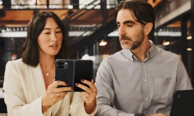 A woman holding a Google Pixel 9 Pro Fold