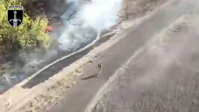 One man is seen on the footage running ahead of the drone strike and manages to escape the ambush from his own side