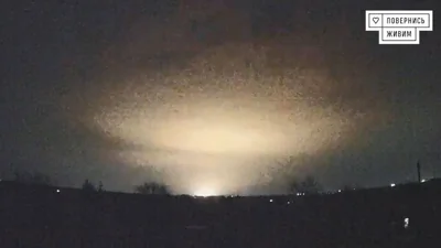 Footage released by a Ukranian charity show flashes over Dnipro of possible Russia intercontinental ballistic missile attack