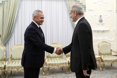 President Masoud Pezeshkian shakes hands with secretary of Russia's Security Council Sergei Shoigu in Tehran, Iran, Monday, Aug. 5, 2024.