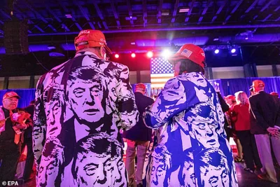 A ballroom full of Trump fanatics, surrogates and allies is filled at the Palm Beach Convention Center for a watch party on Election Night